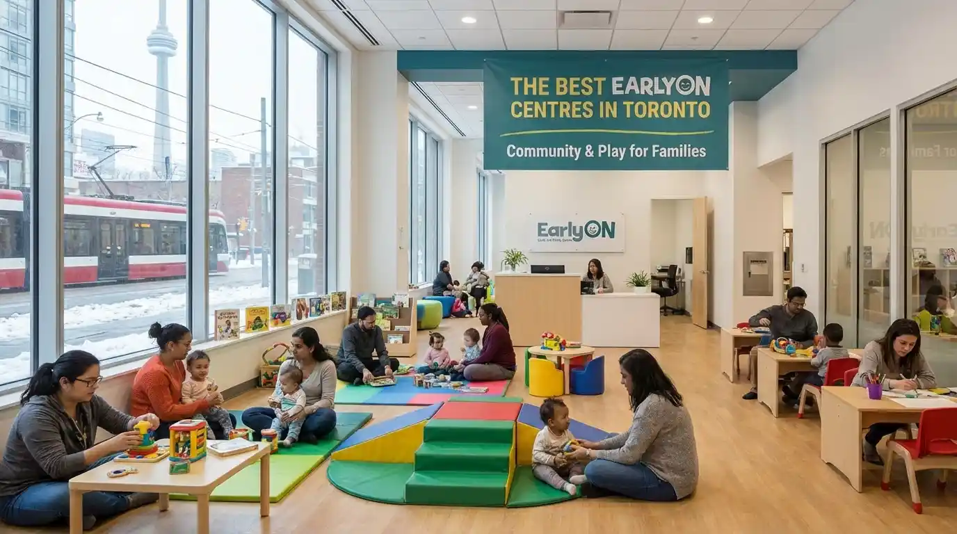 Caregivers and children playing together at an EarlyON Child and Family Centre in downtown Toronto, with the CN Tower visible through snowy windows — showcasing free community programs for families with babies and toddlers.